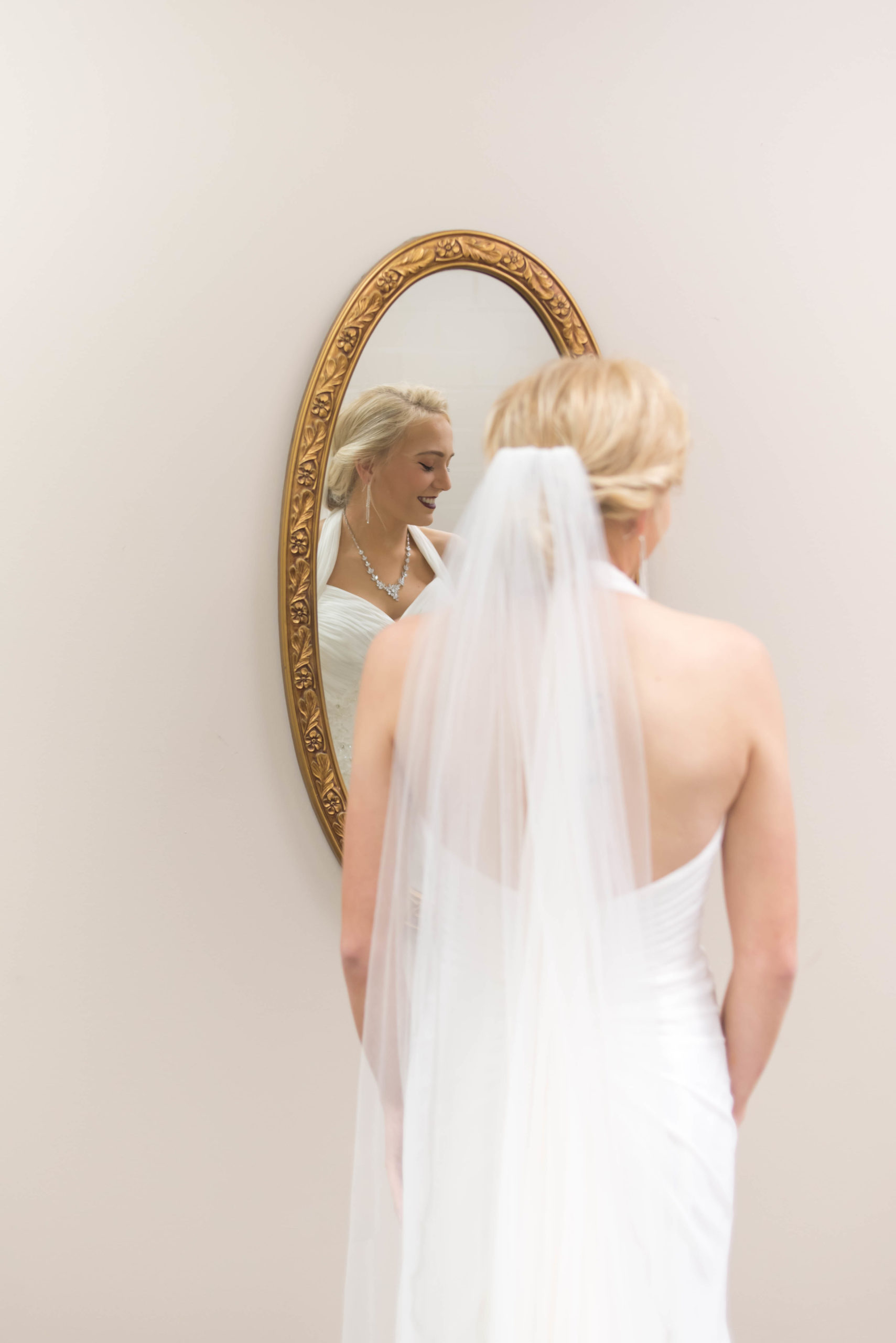 Bride getting ready for her wedding. Miranda Burchfield Photography, LLC.